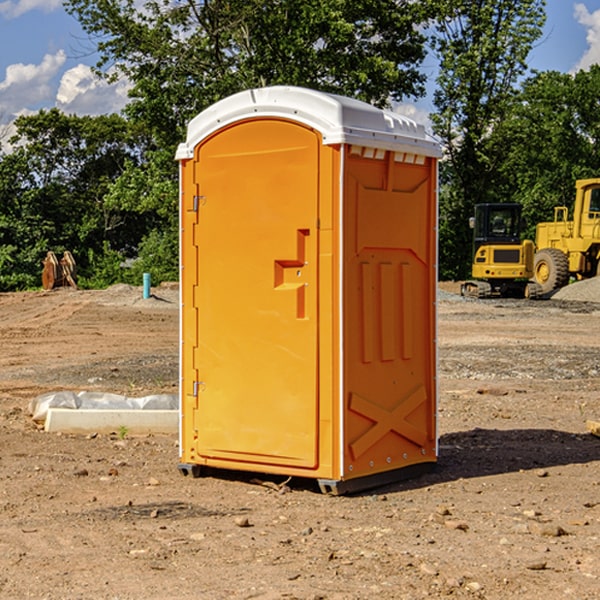 what is the cost difference between standard and deluxe portable restroom rentals in Cardin